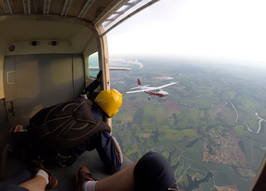 Terrifying Footage Shows Parachuter Stuck on Airplane Wing