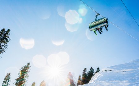 Skier Dangles From Ski Lift as Friends Hang on for Dear Life