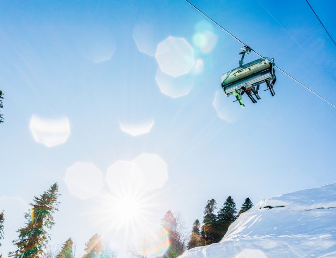 Skier Dangles From Ski Lift as Friends Hang on for Dear Life