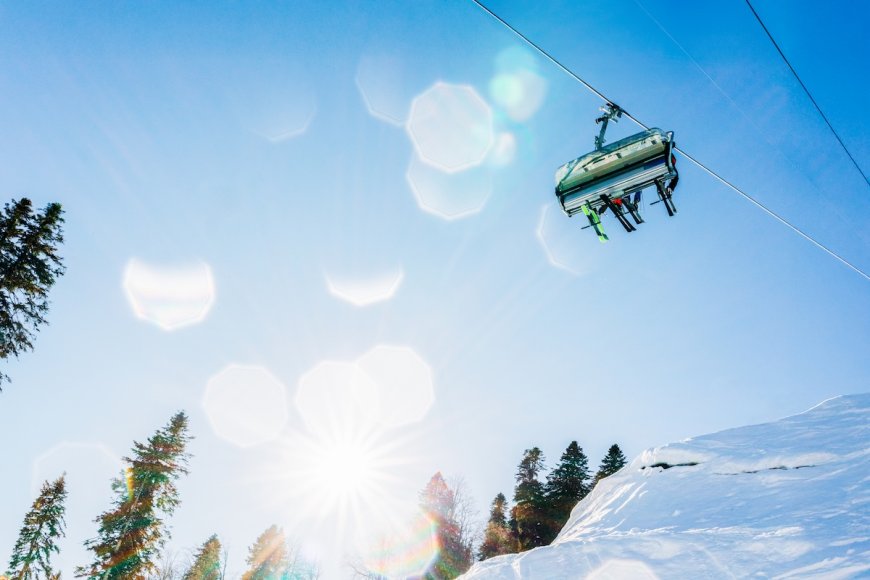 Skier Dangles From Ski Lift as Friends Hang on for Dear Life