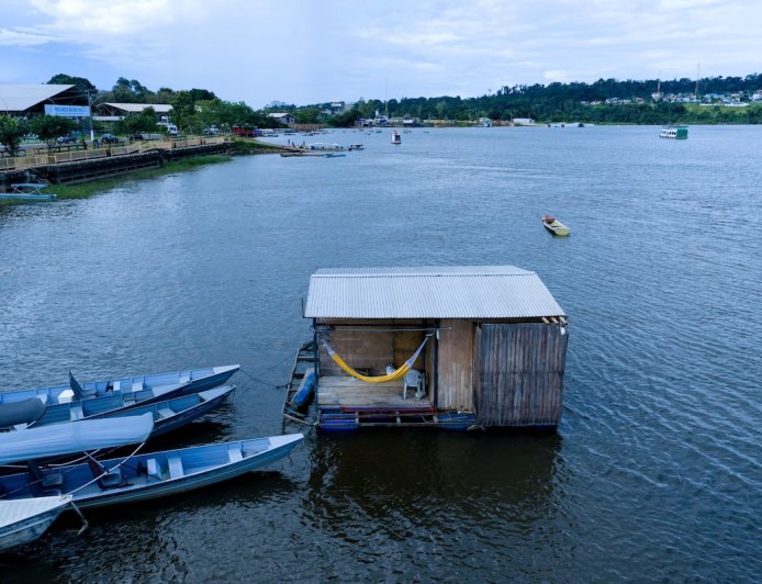 Man Cracks Code on Living Rent-Free in Tiny Houseboat (Video)