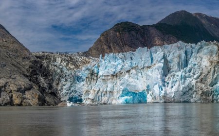 Glacier Collapses in Front of Tour Boat—Watch What Happens